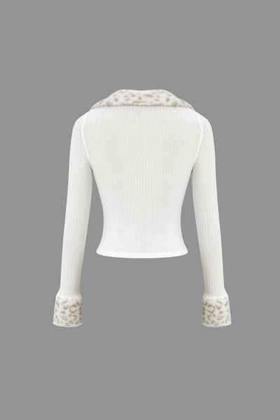 Pull zippé garni de fausse fourrure