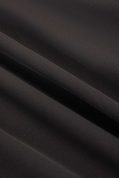 Pantalon large plissé asymétrique