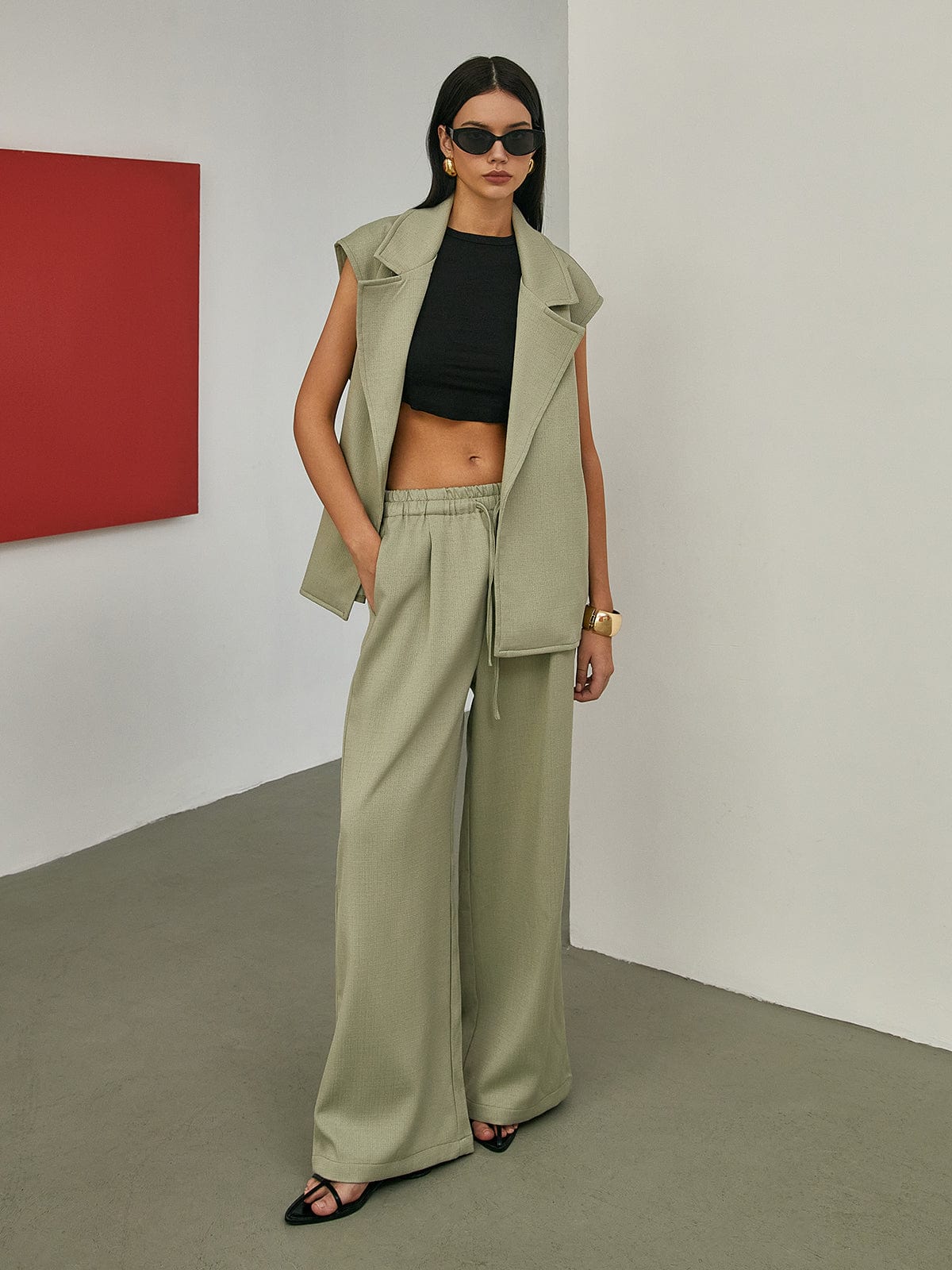 Gilet ajusté uni avec ceinture