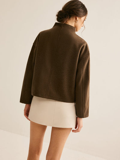 Manteau en laine doublement zippé