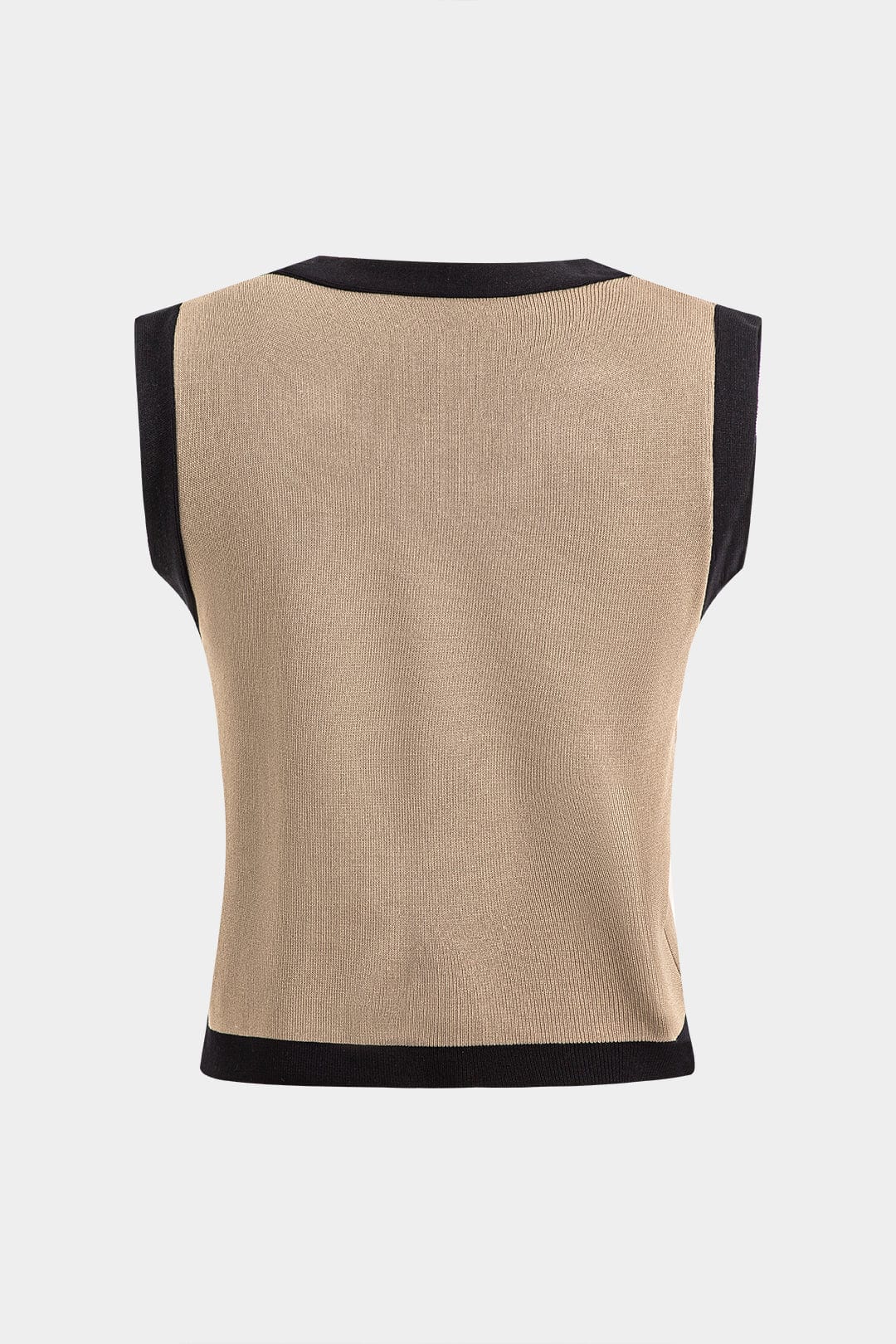 Ensemble tricot cardigan, débardeur et pantalon, coupe ample et élégante.