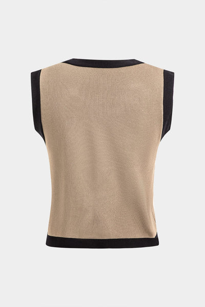 Ensemble tricot cardigan, débardeur et pantalon, coupe ample et élégante.