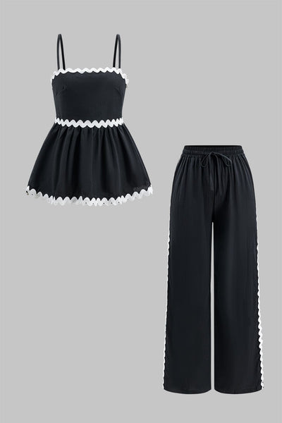 Ensemble élégant deux pièces avec top froncé et pantalon large noué.