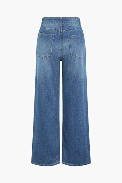 Jean en denim déchiré avec zip, effet usé et coupe ajustée. Pantalon tendance pour un style casual et urbain.