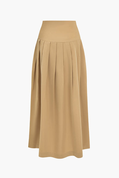 Jupe plissée taille haute, élégante, fluide et confortable, en polyester.