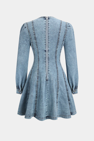 Robe corset zippée en denim, manches longues et coupe ajustée pour un look tendance et féminin.