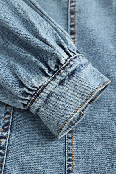 Robe corset zippée en denim, manches longues et coupe ajustée pour un look tendance et féminin.