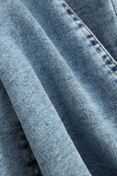 Robe corset zippée en denim, manches longues et coupe ajustée pour un look tendance et féminin.