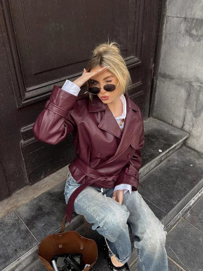 Veste droite en cuir ceinturée