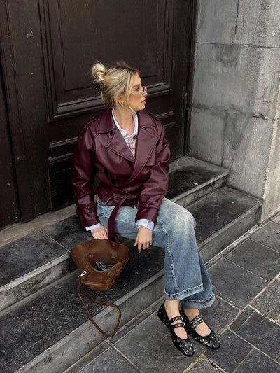 Veste droite en cuir ceinturée
