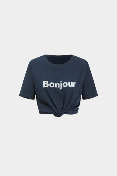T-shirt ample en jersey avec imprimé lettrage, manches courtes et col rond.